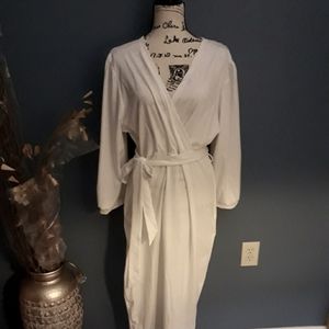 Dress, New A line White dress with a belt.